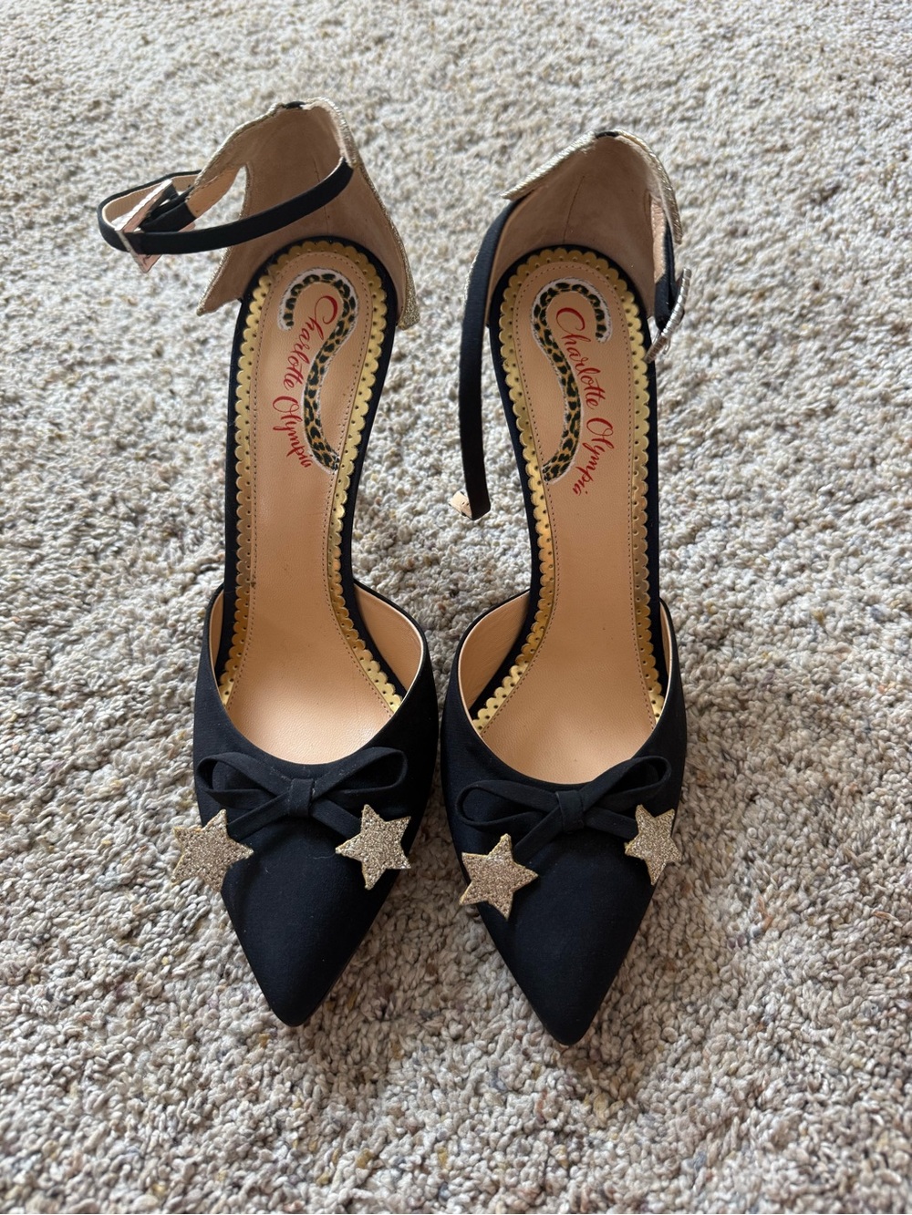 Charlotte Olympia Black Pointed-Toe Ankle-Strap Heels with Gold Star Accents